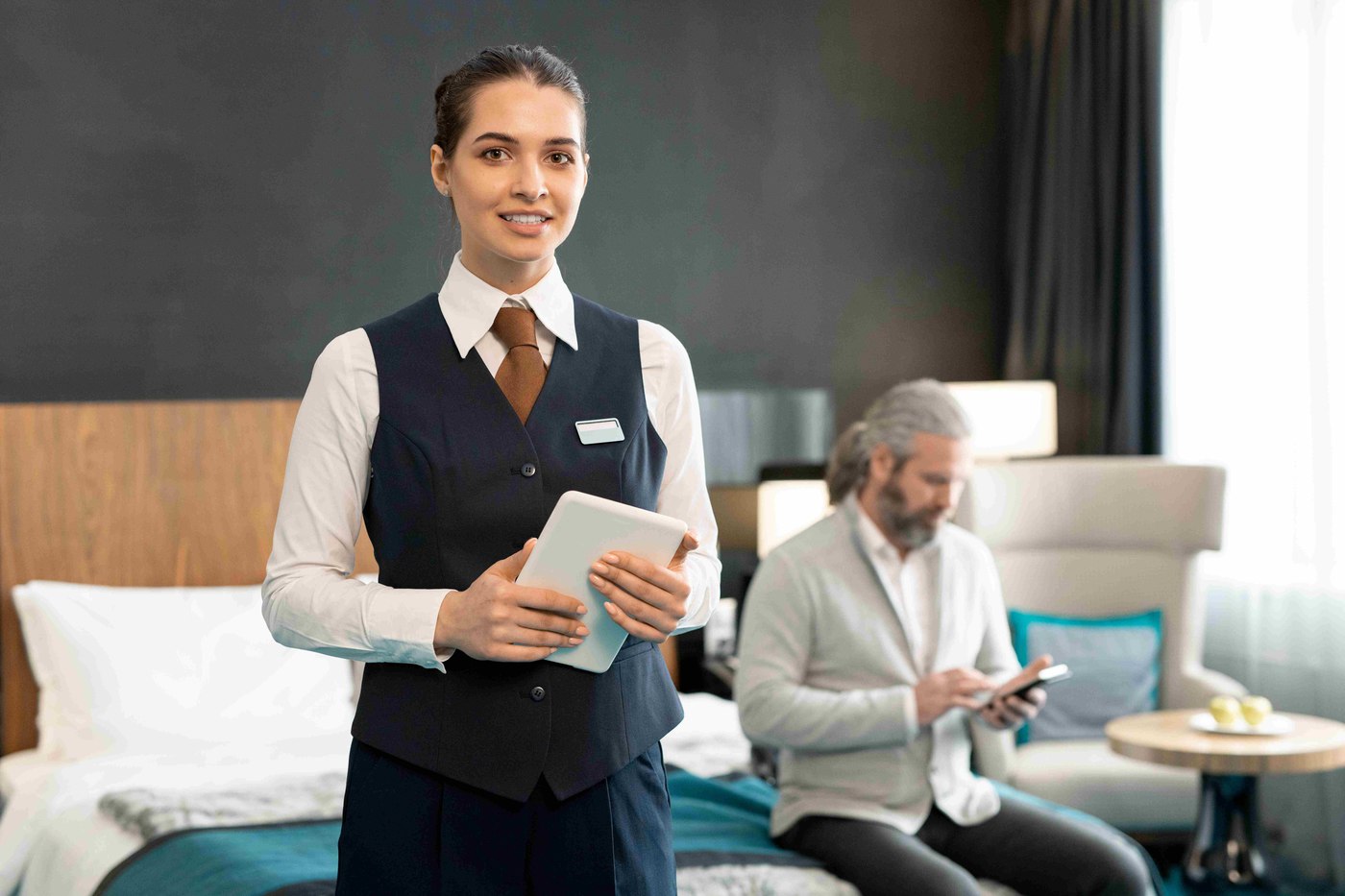 hotel worker in bedroom